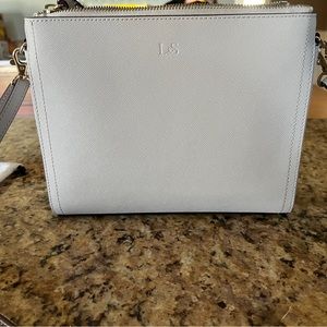 Lo & Sons Pearl in light grey saffiano leather.